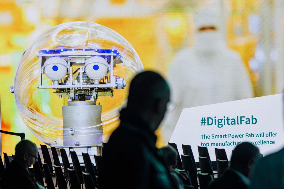 A picture of a robotic device is screened ahead the groundbreaking ceremony of German semiconductor manufacturer Infineon Technologies AG at the company's plant in Dresden, eastern Germany, on May 02, 2023. 